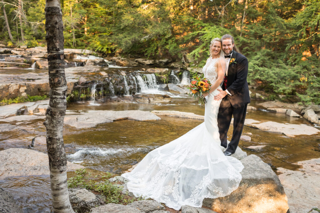 Eagle Mountain House Wedding Couple Posing at Jackson Falls